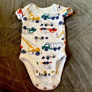 White onesie with tractor